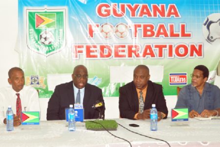  FIFA Developmental Officer Howard McIntosh (second left) addressing the media gathering during yesterday’s GFF press conference while members of the GFF inclusive of Committee Member Keith O’Jeer (left), President Christopher Matthias (second right) and General Secretary Noel Adonis look on. (Orlando Charles photo)
