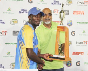 Jonathan Carter receives his man of the match award for his maiden century on Sunday at the Queen’s Park Oval in the match aginst host Trinidad and Tobago which Barbados won by 28 runs. (WICB media photo) 