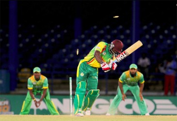 Ronsford Beaton, right jumps for joy after dismissing Windwards opener Devon Smith yesterday. (WICB media photo) 