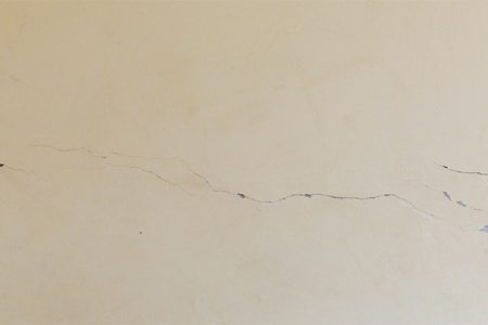  Cracks in the walls of the Sand Creek Secondary School