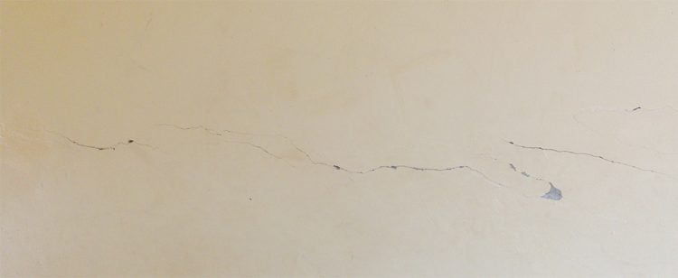  Cracks in the walls of the Sand Creek Secondary School