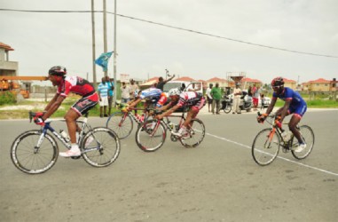 Epic finish! Michael Anthony took the spoils of the R&R International sponsored 40-mile road race yesterday in a thrilling sprint finish. (Orlando Charles photo) 