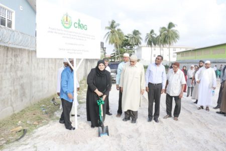 The Central Islamic Organisation of Guyana (CIOG) yesterday turned sod on the site for a planned medical centre on Thomas Street, Georgetown. The establishment of the centre is being funded by the Islamic Development Bank along with the OUHLA Foundation, UK. In photo, Aleema Nasir, Chairperson of the Rights of the Child Commission and CIOG member, turns the sod for the planned site. Chief Medical Officer Shamdeo Persaud, who was present during the proceedings, lauded the project. (Photo by Arian Browne)