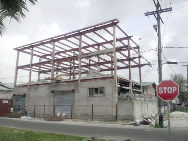This three-storey building on the corner of North Road and Oronoque Street is in the process of being demolished. Stabroek News was made to understand that while construction started some time ago, it was only recently that it was discovered that the building was sinking. A source told this newspaper that the building was being taken down because of its poor foundation. “The building doesn’t have any piles so the building is sinking. We decided to take it down for the safety of citizens,” the source said.  The owner of the building could not be contacted yesterday for comment. Questions have been raised in the past about the foundations of high-rise buildings. (Photo by Tifaine Rutherford)