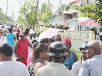 A crowd gathered outside of the school 