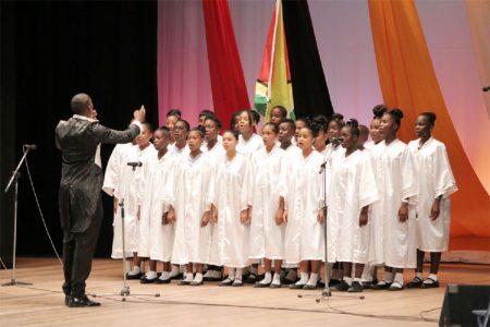 The Region 6 Combined Choir, comprising schools in that region, performs in the choral segment of the Children’s Mashramani Competition Final at the National Cultural Centre yesterday. (Photo by Arian Browne)