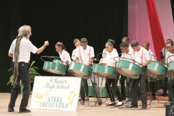 The St Rose’s High School Steel Orchestra performs in the steel band preliminaries during the Children’s Mashramani Competition Final at the National Cultural Centre yesterday. (Photo by Arian Browne) 
