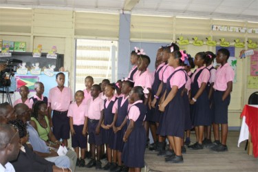 Grade Six students singing a patriotic song during the consultation before the sod turning ceremony. 