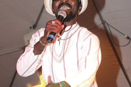 The 2014 Mashramani Calypso Monarch Lester ‘De Professor’ Charles during his winning performance of “Is De Truth.” (Photo by Arian Browne)