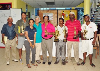 Mike Mangal (third from right) poses with the other prize winners following yesterday’s presentation ceremony. (Orlando Charles photo) 