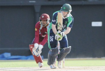 Ireland’s Ed Joyce scores runs on the leg side during his unbeaten innings of 40 yesterday. (WICB media photo) 