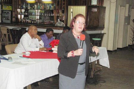 Presidential Advisor on Governance Gail Teixeira emphasising a point during her presentation at the town hall Meeting in Linden. (Government Information Agency photo) 