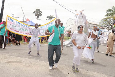 Education Minister Priya Manickchand (right) leading her Ministry’s float