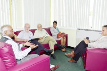 Commissioner of Information Justice Charles Ramson (left) meets with members of the Private Sector Commission 
