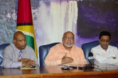 President Donald Ramotar making a point during the press conference. Also in photo are Minister of Legal Affairs Anil Nandlall (right) and Minister in the Ministry of Finance Juan Edghill. (GINA photo) 