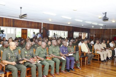 Prime Minister Samuel Hinds among senior and junior staff of the Guyana Defence Force (GINA photo)  