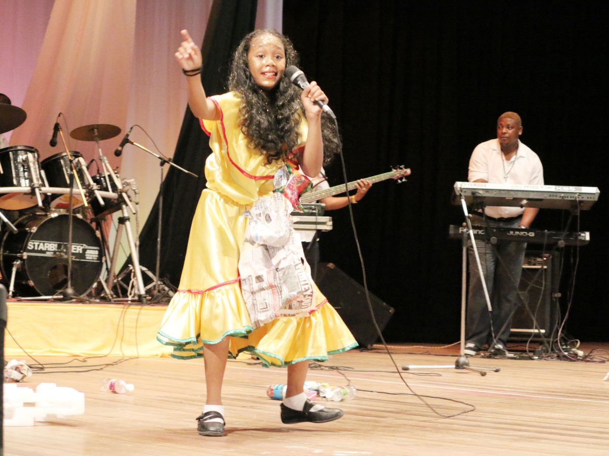 Michelle Brutus of the Success Elementary Primary in a calypso about the garbage dilemma in the children’s Mash contest at the National Cultural Centre yesterday.