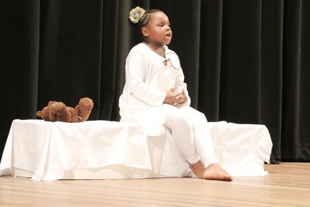 Jazara Williams of Green Acres Primary performing `I forgive you daddy’  in the dramatic poetry segment of the children’s Mashramani contest finals yesterday at the National Cultural Centre.
