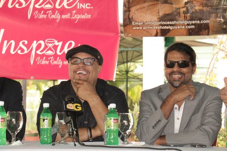 From left yesterday are Grammy award-winning Christian singer, Isaac Houghton and promoter Yog Mahadeo. They were at a press conference at the Princess Hotel speaking about preparations for last night’s gospel concert at the National Stadium.