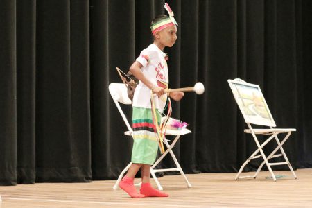 Mohamed Hussain of Blairmont Primary bringing to life his Mashramani theme in the dramatic poetry segment of the children’s Mashramani contest yesterday at the National Cultural Centre.