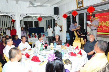 President of the Chinese Association Shiloning Chow addressing guests at the Chinese Association dinner as part of Chinese New Year festivities yesterday at the Chinese Association Building on Brickdam (GINA photo)