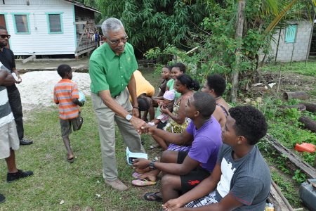 On Friday 31st January and Saturday 1st February 2014, A Partnership for National Unity (APNU) Members of Parliament led by Opposition Leader Brigadier David Granger conducted an out-reach exercise in Linden- Upper Demerara- Berbice Region. In this APNU photo, Granger greets some youngsters.