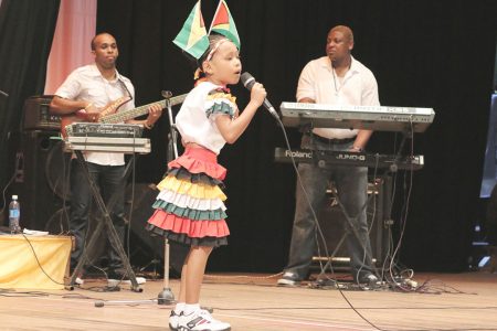 Sarah Fredericks of Mainstay Lake, Region Two singing `People in Society’ in the calypso segment of the children’s Mashramani contest yesterday at the National Cultural Centre.