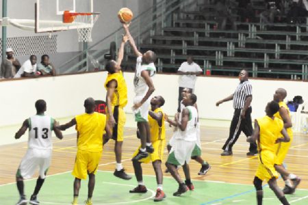 Action in the game between Kings of Linden and Republic Bank Nets Saturday night at the Cliff Anderson Sports Hall. (Orlando Charles photo)