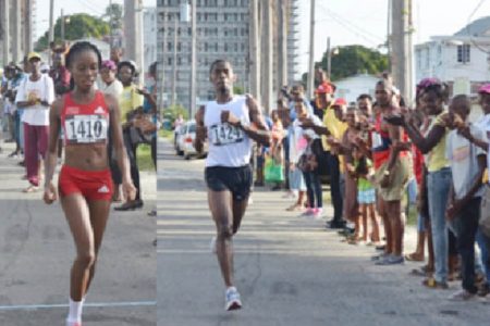 All alone! Male and female Wartsila 20K road race Cleveland Forde and Tanya Nero are all alone as they approach the finish line on Sunday. (Orlando Charles photos)