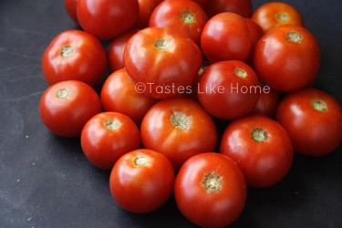 Red, round, ripe tomatoes (Photo by Cynthia Nelson) 