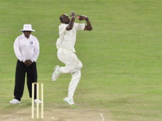 Sulieman Benn takes a simple return catch off Keon Joseph as defending champions Barbados completed a comfortable 136-run win over Guyana at the National Stadium at Providence yesterday. (Orlando Charles photo)    