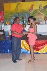 Junior Calypso Monarch, Shontelle Gittens (right) receiving her prize 