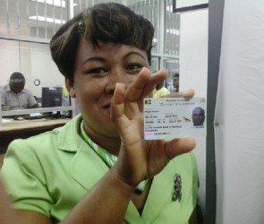  GRA’s Public Relations Manager, Marcia Harris displays one of the new automated driver’s licences.
