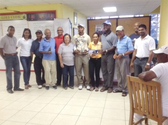Winners and officials of the Maurice Solomon Accounting Firm-sponsored golf tourney after Saturday’s conclusion.