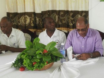 From left are Roland Fletcher of CASRI, Kelvin Craig and Agriculture Minister, Dr Leslie Ramsammy 