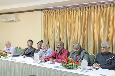From right are Gecom Chairman, Dr Steve Surujbally; new Chief Election Officer, Keith Lowenfield and Gecom commissioners Vincent Alexander,    Mohamood Shaw, Sandra Jones,  Athmaram Mangar and Dr Keshav Mangal.