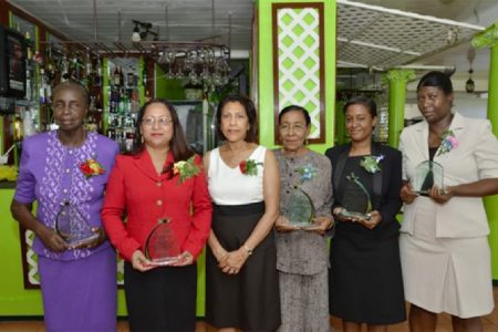 The Guyana Parliament yesterday honoured women in its annual International Women’s Day luncheon at Duke Lodge, Kingston for long and dedicated service.
GINA said that those honoured with special awards were Government Members of Parliament, past and present, Minister of Amerindian Affairs Pauline Sukhai for 20 years of service; Philomena Sahoye-Shury for 15 years of service; and Shirley Edwards for 18 years of service. Opposition Member of Parliament Deborah Backer was also honoured for 14 years of service and staff member of the Parliament Office Eleanor Coddett for 30 years of service.From left to right are: Shirley Edwards, Philomena Sahoye-Shury, First Lady Deolatchmee Ramotar, Amerindian Affairs Pauline Sukhai,  daughter of Opposition Member of Parliament Deborah Backer who received her mother’s award and staff member of the Parliament Office Eleanor Coddett. (GINA photo)