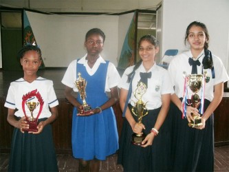 Joint first place winners: From left: Shaquana Goodluck of New Amsterdam Primary and Cindy Cossiah of St Aloysius Primary and Raveena Shiwprasad and Gaitry Rampersaud of Berbice High School  