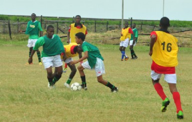 Action between Lodge Secondary and St. Mary’s Secondary during their matchup yesterday. 