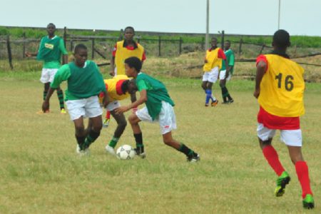 Action between Lodge Secondary and St. Mary’s Secondary during their matchup yesterday.