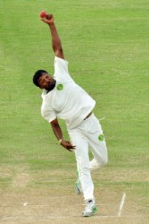 Veerasammy Permaul put his all into his bowling yesterday and was rewarded with figures of 6-42 as Guyana fought back against the Windward Islands. (Orlando Charles photo) 