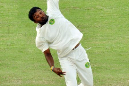 Veerasammy Permaul put his all into his bowling yesterday and was rewarded with figures of 6-42 as Guyana fought back against the Windward Islands. (Orlando Charles photo)
