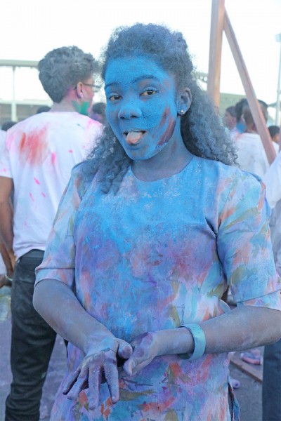 Feeling blue… A Phagwah reveller at Inspire Inc’s activity at the Guyana National Stadium, Providence yesterday. (Photo by Arian Browne) 