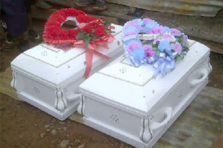 The remains of the five La Cruz family members were divided between two caskets.
