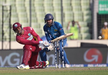 Opener Dwayne Smith gathers runs on the leg side during his top score of 60 yesterday. (Photo courtesy of WICB media)