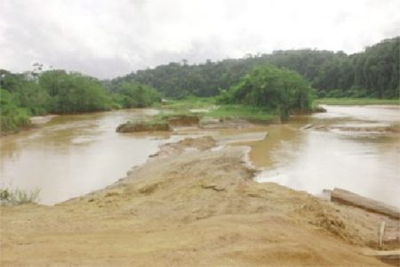 The polluted Konawaruk River with the banks dug up in September last year (SN file photo).

