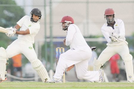 Guyana’s Assad Fudadin cuts during his top score of 71 yesterday. (Photo courtesy of WICB media)