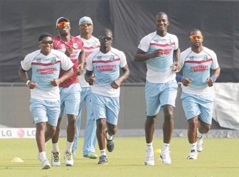 Darren Sammy and some members of the West Indies team warming up ahead of today’s showdown against powerhouses India. (Photo WICB media)