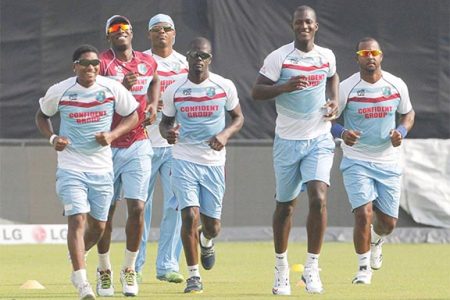 Darren Sammy and some members of the West Indies team warming up ahead of today’s showdown against powerhouses India. (Photo WICB media)