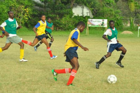 Action in the match between Charlestown Secondary and Kingston High. (Orlando Charles photo